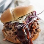 slow cooker pulled pork on a sandw