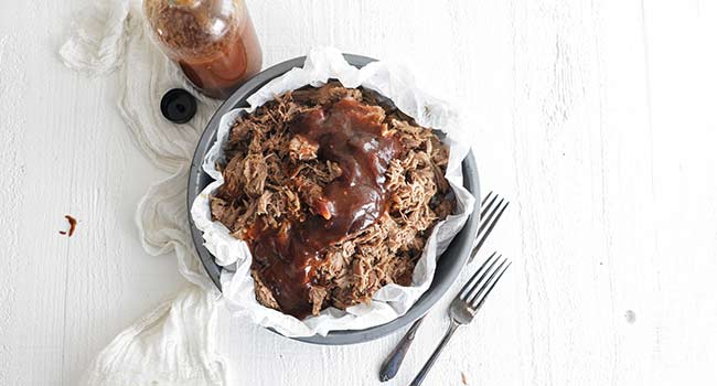 slow cooked pork in a pan