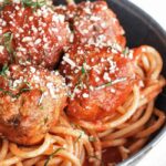 spaghetti and meatballs in a bowl