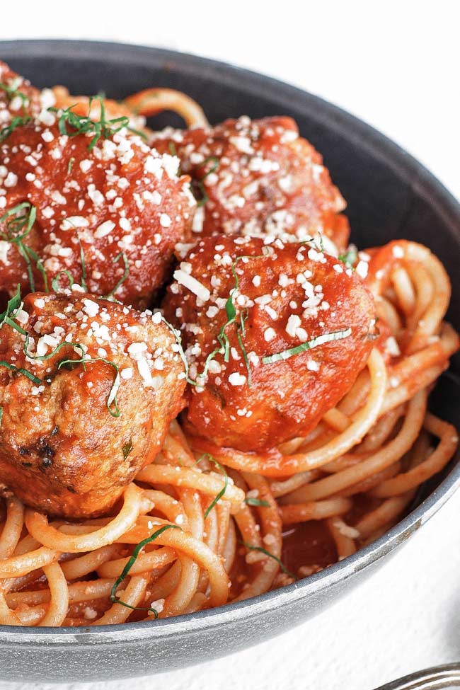 spaghetti and meatballs in a bowl