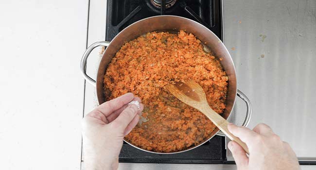 sweating vegetables in a pot