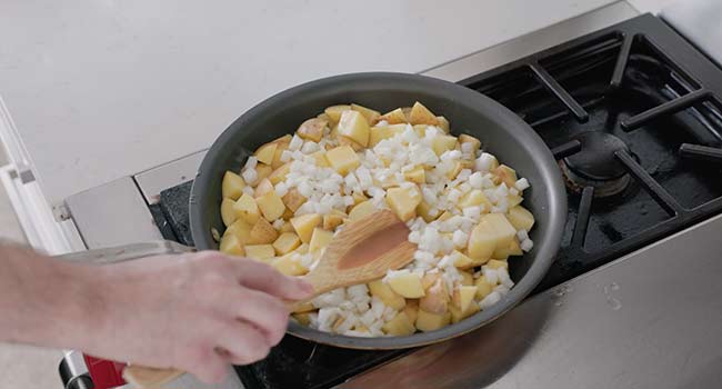 potatoes and onions in a pan