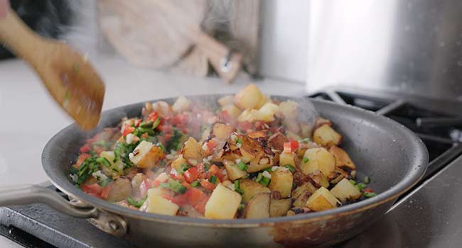 cooking peppers and potatoes