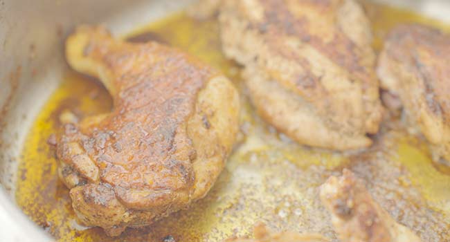 browned chicken in a pan