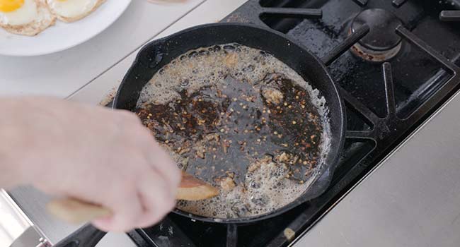 boiling a sauce in a pan