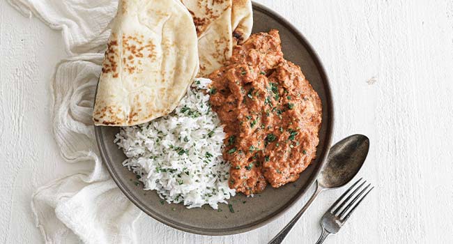 tikka masala with naan and rice