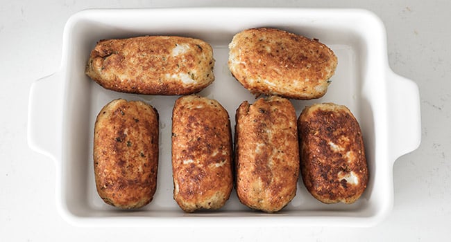 chicken braciole in a baking dish