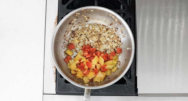 cooking onions and peppers