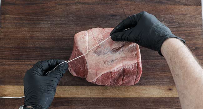 tying a knot on beef