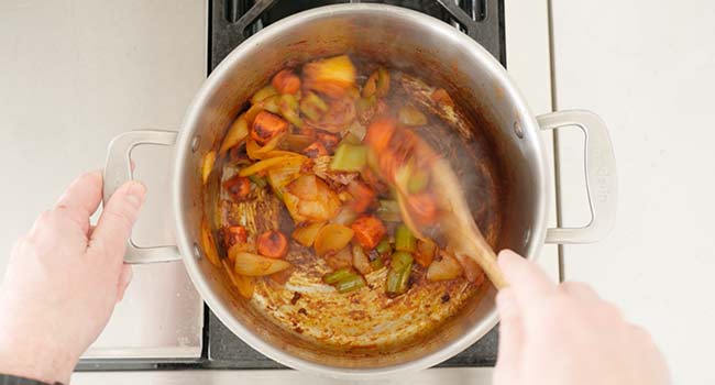 cooking veggies with tomato paste