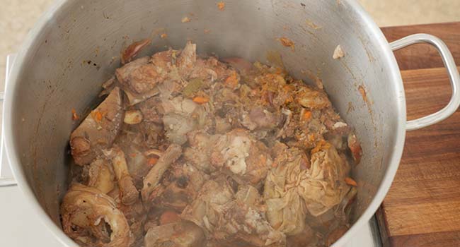 roasted bones and mirepoix in a pot