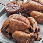 smoked cornish hens on a platter