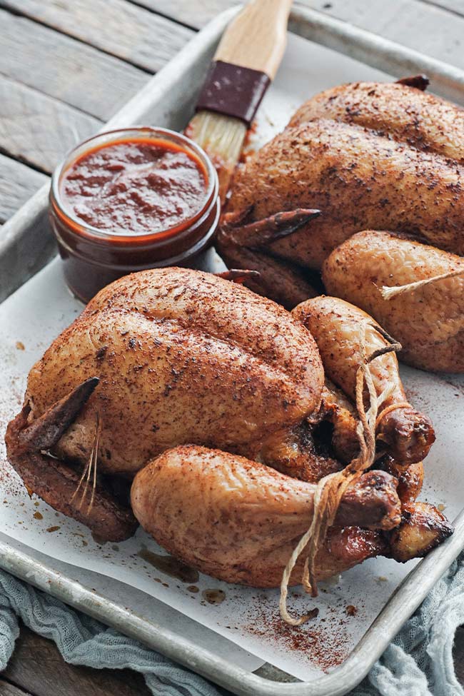 smoked cornish hens on a platter