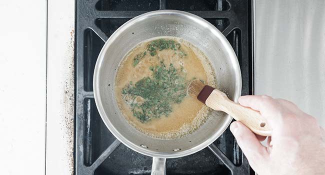 heating a maple sage glaze in a pot