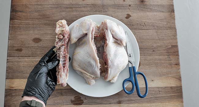 removing the backbone of a whole chicken