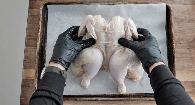 flattening a chicken