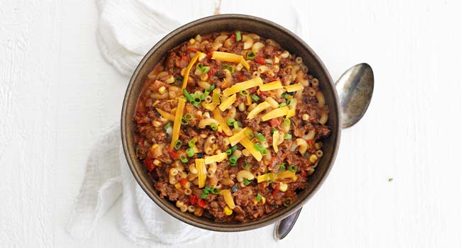 texas goulash with cheese and green onions