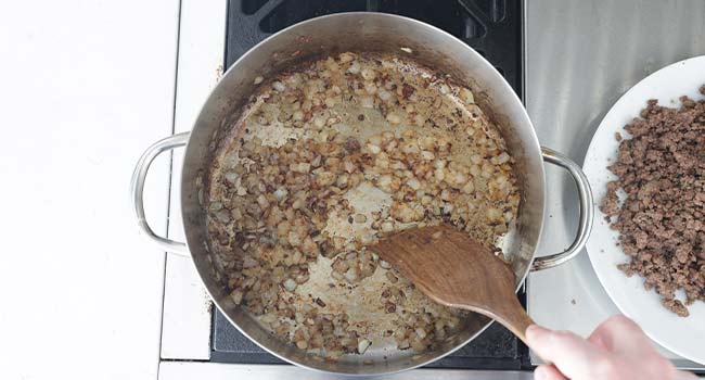 browning onions in a pan