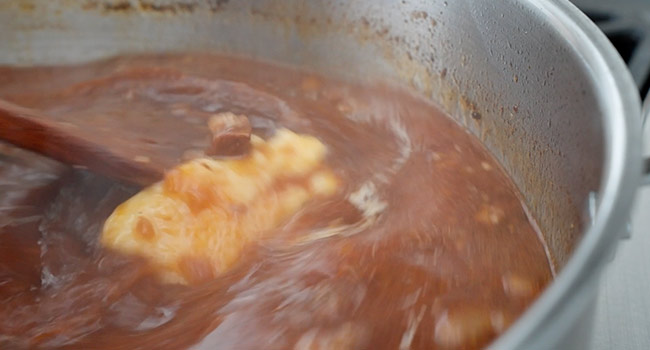 stirring a beurre manie into a pot