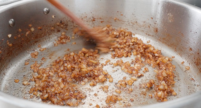 stirring onions