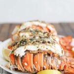 broiled lobster tails on a plate