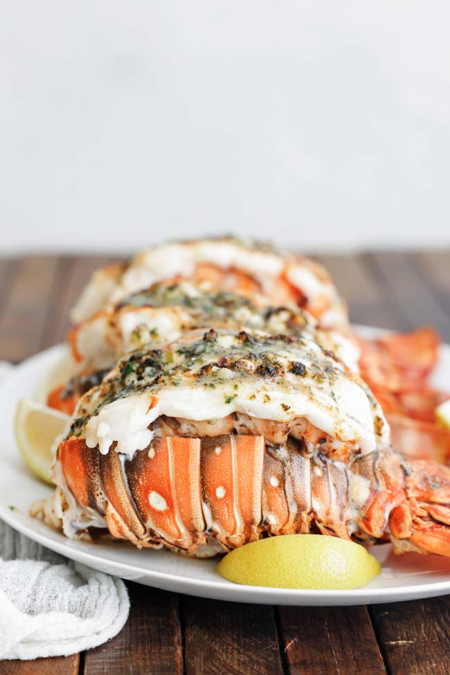 broiled lobster tails on a plate