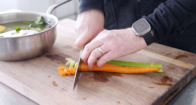 cutting celery and carrots