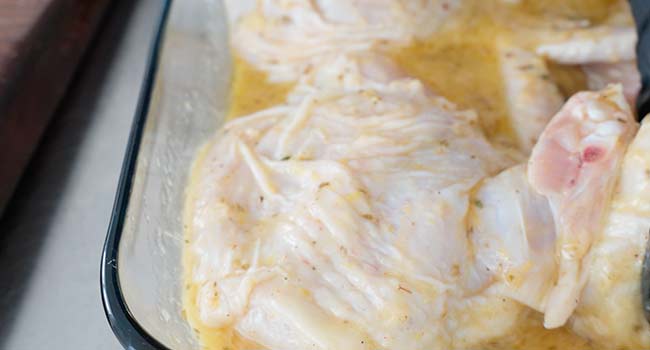 marinated chicken in a casserole dish