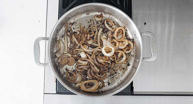 caramelizing onions in a pan