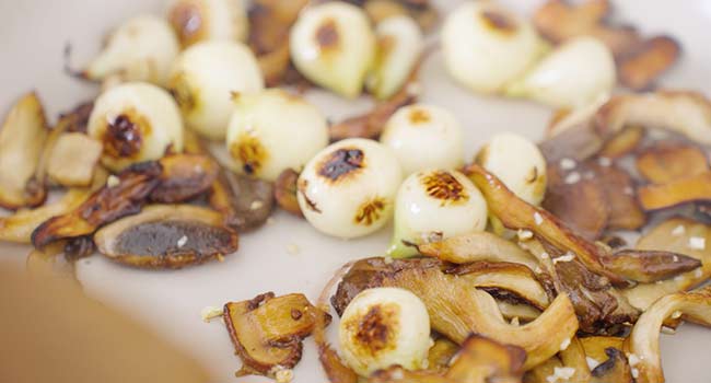 searing mushrooms and pearl onions