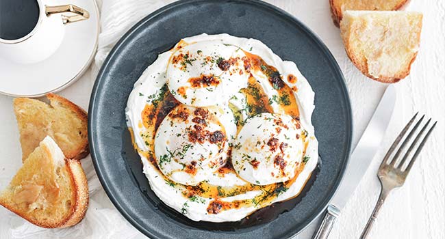 turkish eggs with sauce and yogurt