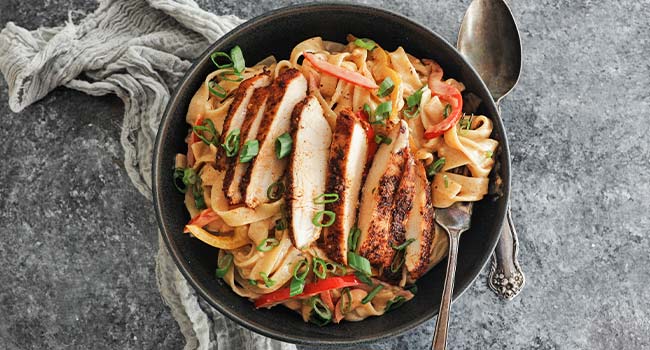 creamy cajun chicken pasta with bell peppers